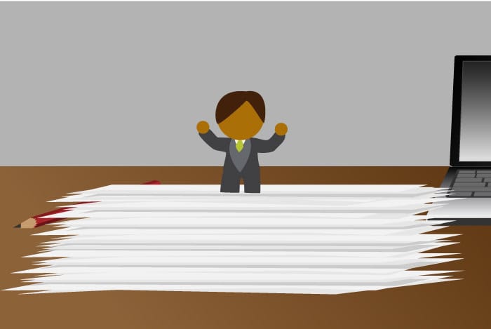 Small person on pile of paper